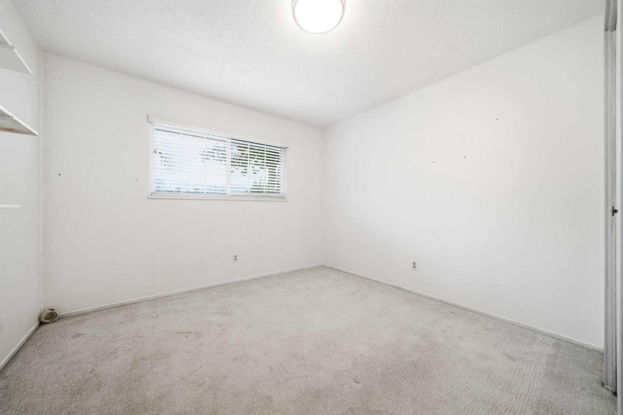 6927 Riata Drive Redding, CA 96002 - Photo 23 of 39 an empty room with a empty space