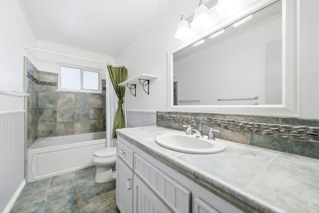 a view of a swimming pool with an outdoor seating and a yard