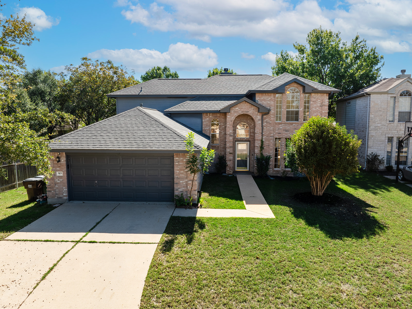 a front view of house with yard slide and outdoor seating
