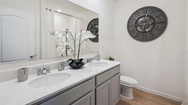 a bathroom with a toilet and a sink