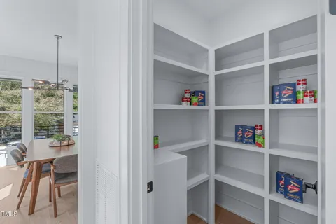 a kitchen with sink cabinets and window