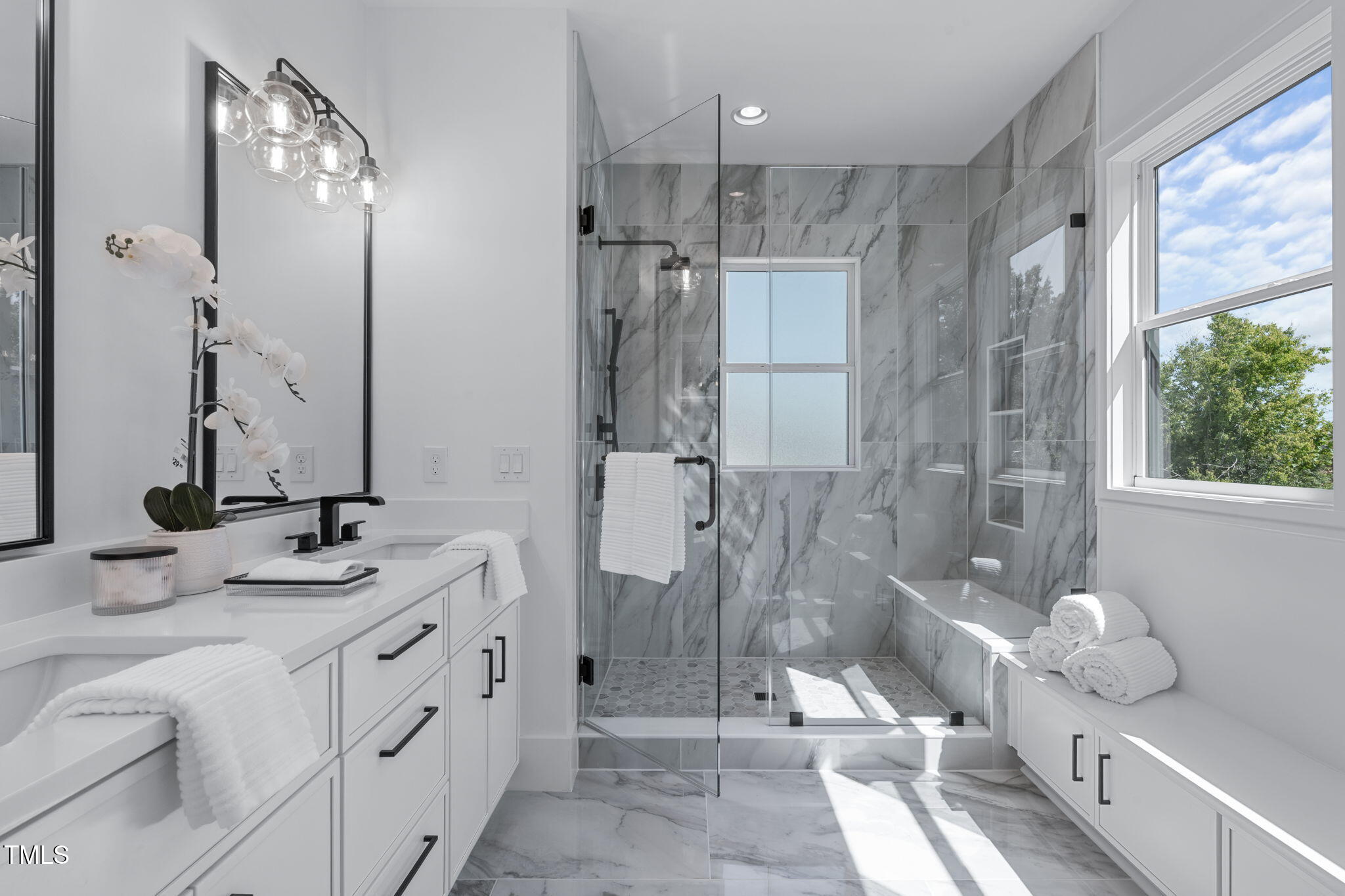 1016 Addison Place Raleigh, NC 27610 - Photo 23 of 50 a bathroom with a double vanity sink mirror and shower