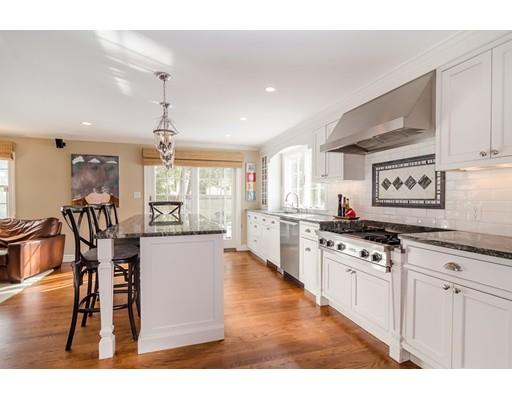 17 Richland Road Wellesley, MA 02481 - Photo 6 of 23 a kitchen with granite countertop a stove a sink and a refrigerator