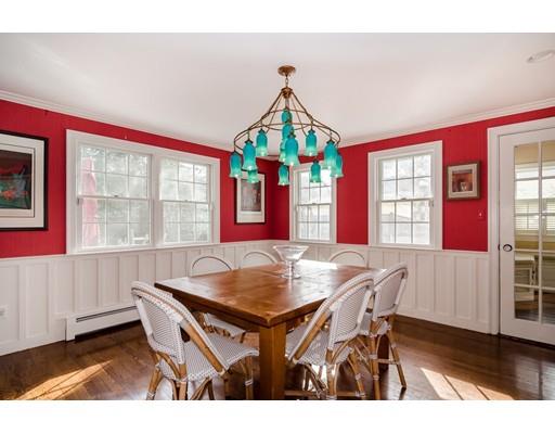 17 Richland Road Wellesley, MA 02481 - Photo 10 of 23 a dining room with a wooden table and chairs