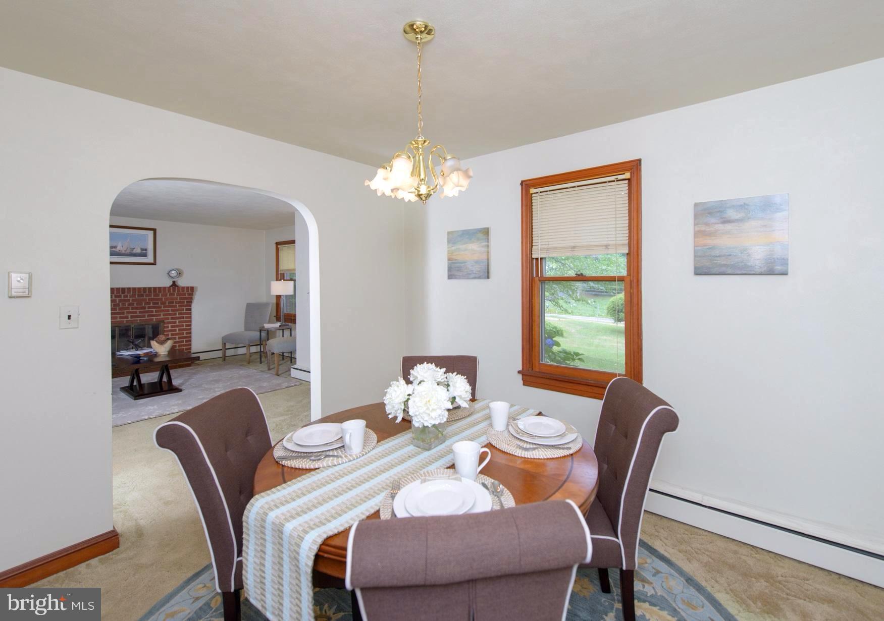 1937 Severn Grove Road Annapolis, MD 21401 - Photo 11 of 30 Dining room with arched doorway to living room