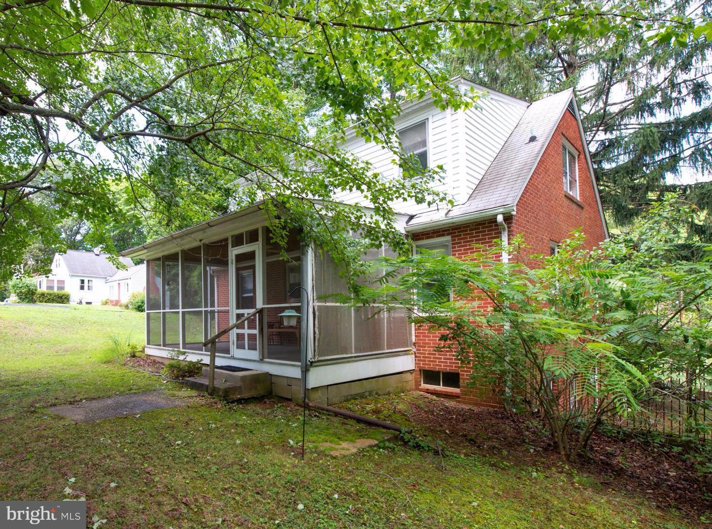 1937 Severn Grove Road Annapolis, MD 21401 - Photo 29 of 30 Screened-in porch with views of the back yard
