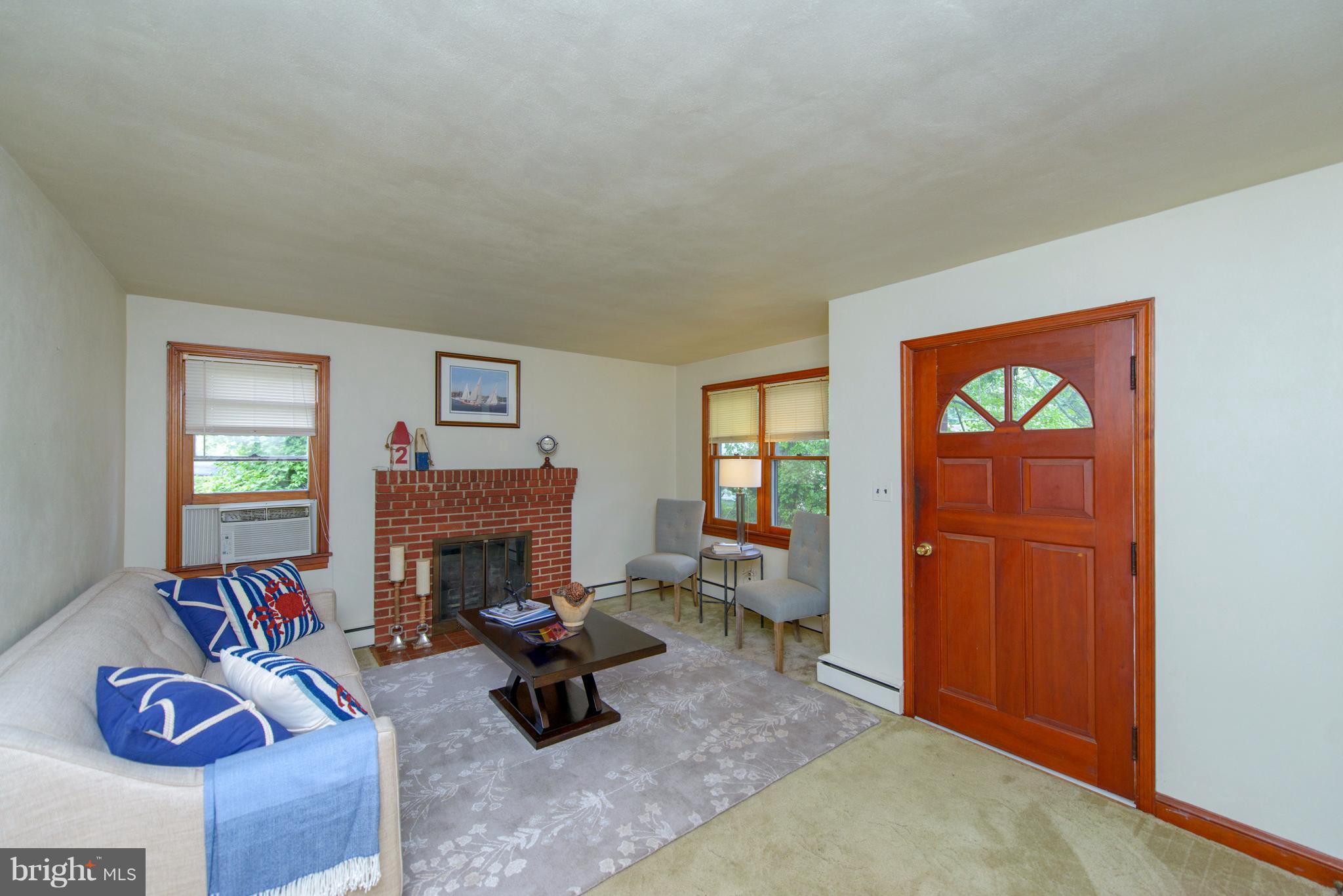 1937 Severn Grove Road Annapolis, MD 21401 - Photo 7 of 30 Living Room has a wood-burning fireplace