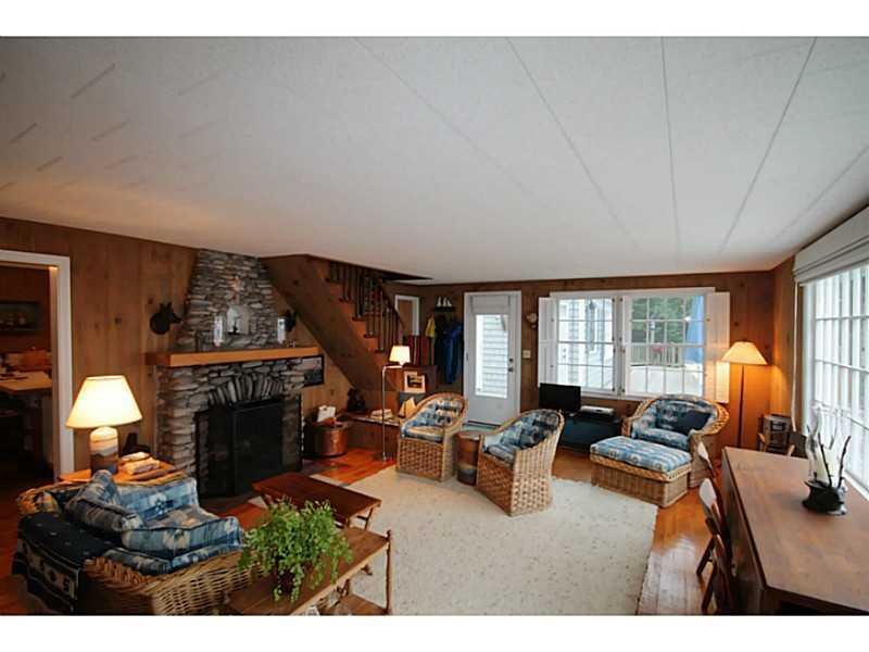 52 Blair Road Southport, ME 04576 - Photo 8 of 17 Living Room. With stone fireplace...