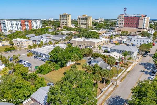 an aerial view of multiple house with outdoor space