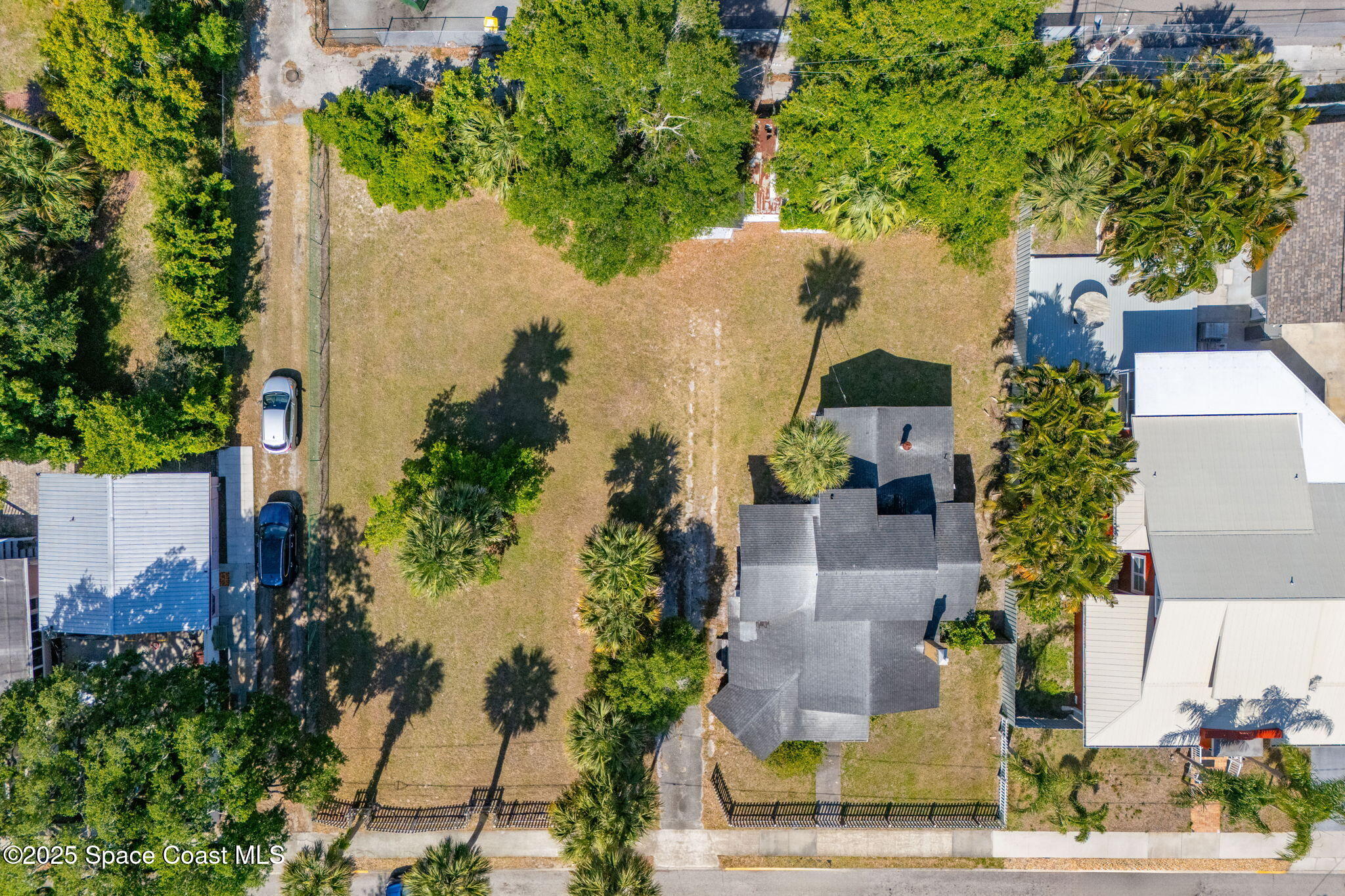 2106 Vernon Place Melbourne, FL 32901 - Photo 31 of 48 an aerial view of a house with a yard