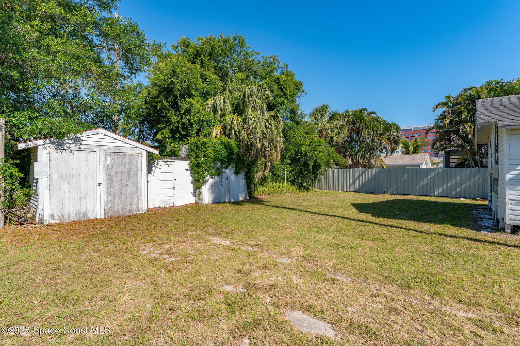 2106 Vernon Place Melbourne, FL 32901 - Photo 43 of 48 a view of a yard with a garage