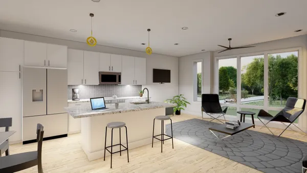 a view of backyard with deck and outdoor seating