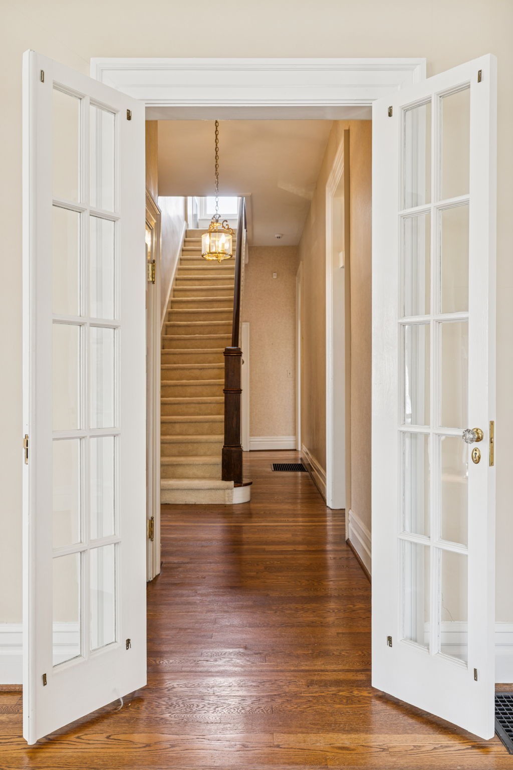215 4th Avenue South Franklin, TN 37064 - Photo 27 of 86 a view of an empty room with wooden floor and a window