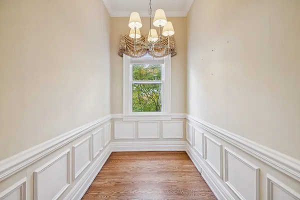 a room with a bed and a window