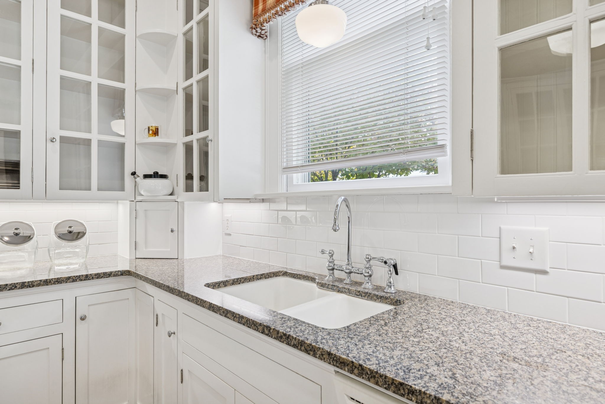 215 4th Avenue South Franklin, TN 37064 - Photo 51 of 86 a bathroom with a granite countertop sink and a window