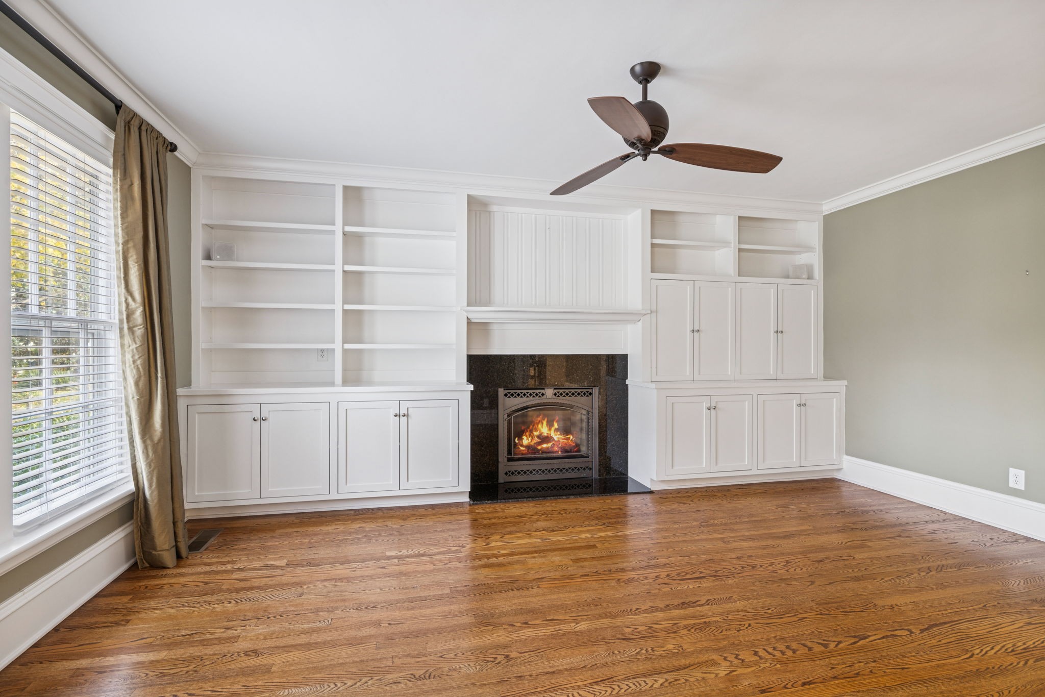 215 4th Avenue South Franklin, TN 37064 - Photo 63 of 86 a living room with furniture and a fireplace