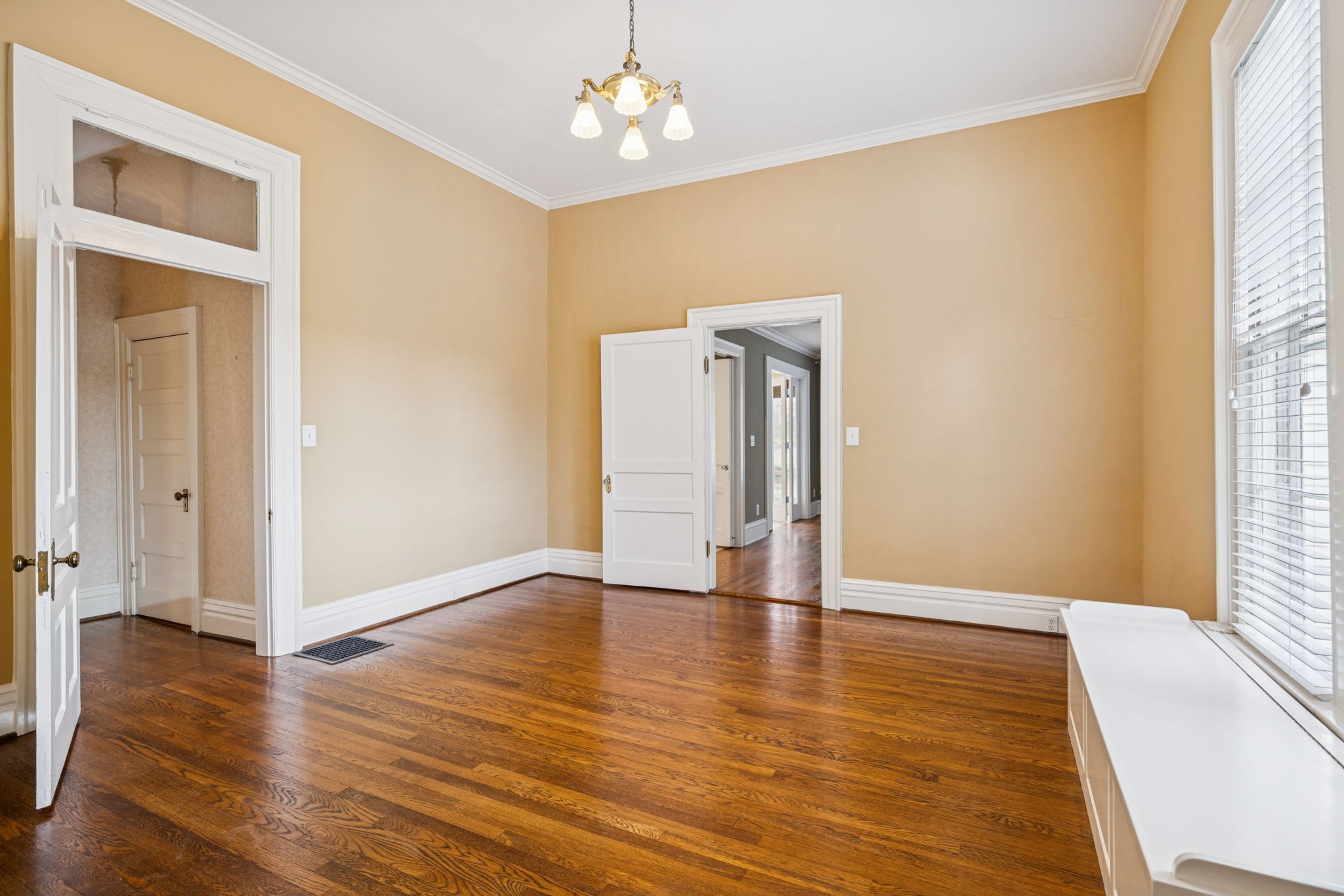 215 4th Avenue South Franklin, TN 37064 - Photo 74 of 86 an empty room with wooden floor and windows
