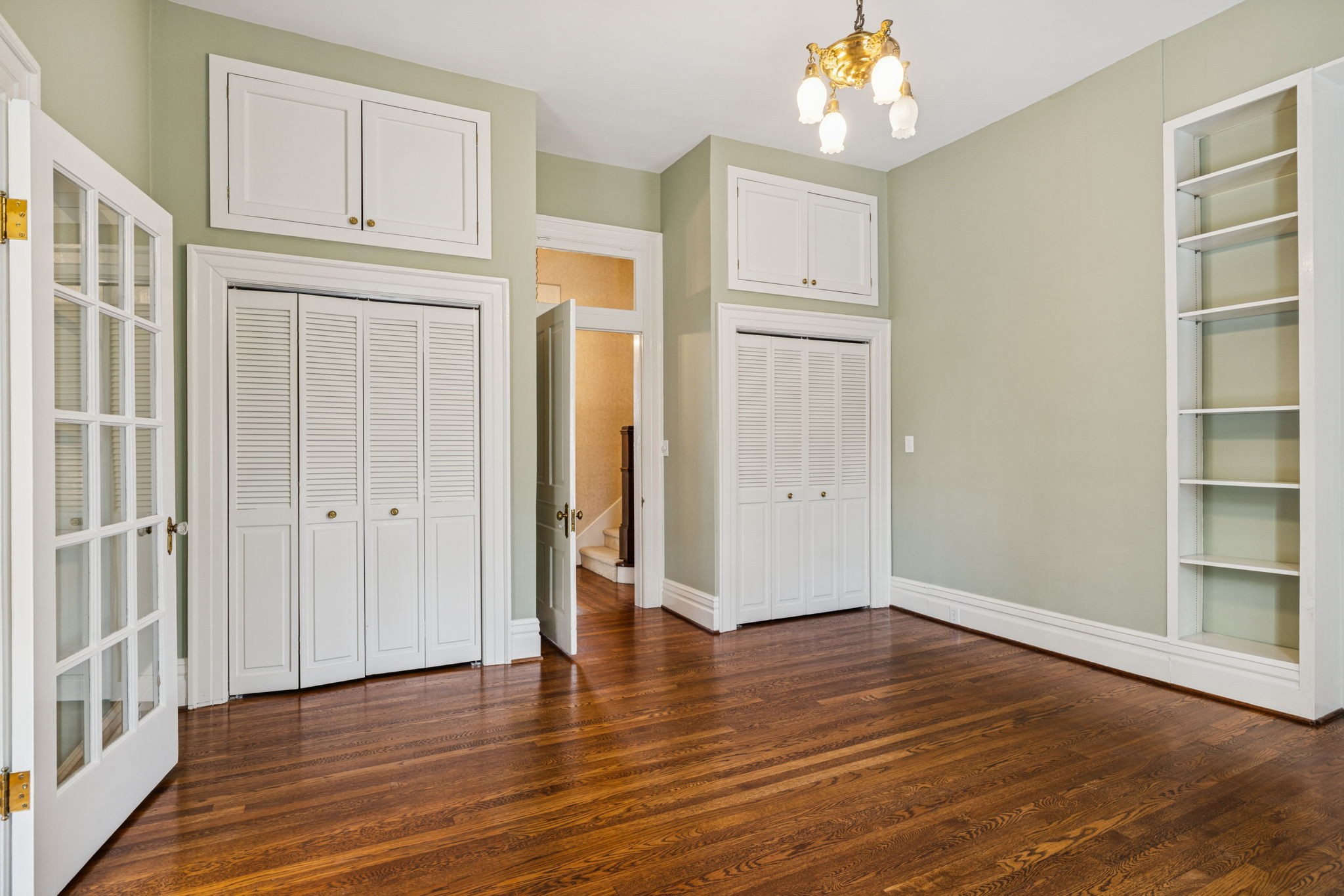 215 4th Avenue South Franklin, TN 37064 - Photo 78 of 86 an empty room with wooden floor cabinet and windows