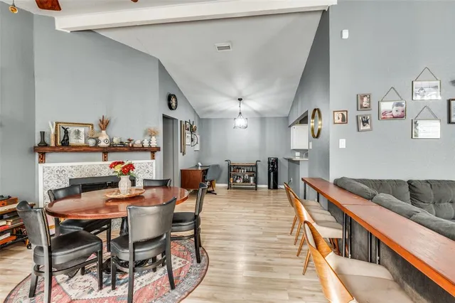 a outdoor space with lots of furniture and wooden floor