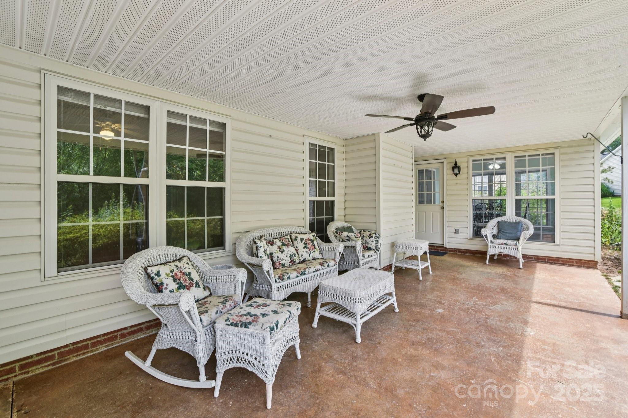 343 Stonehollow Road Fletcher, NC 28732 - Photo 14 of 36 a living room with furniture and a large window