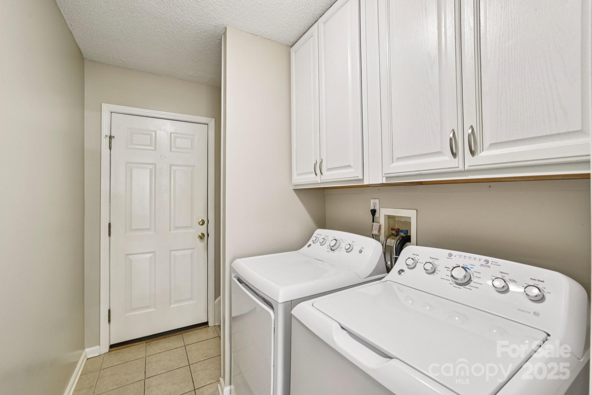 343 Stonehollow Road Fletcher, NC 28732 - Photo 15 of 36 a utility room with dryer and washer