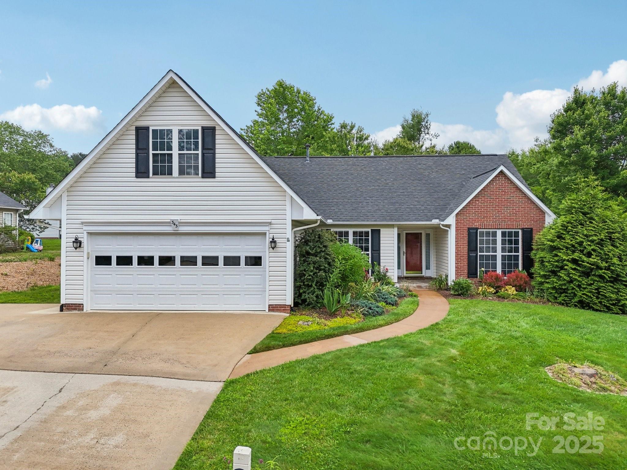 343 Stonehollow Road Fletcher, NC 28732 - Photo 2 of 36 a view of a yard in front of house