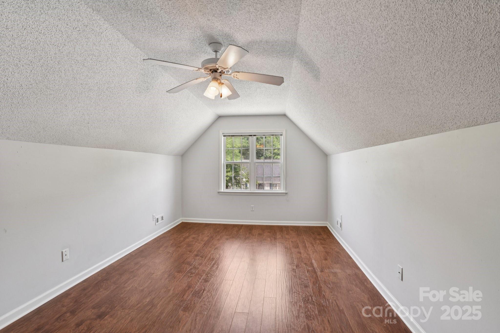 343 Stonehollow Road Fletcher, NC 28732 - Photo 25 of 36 wooden floor in an empty room with a window