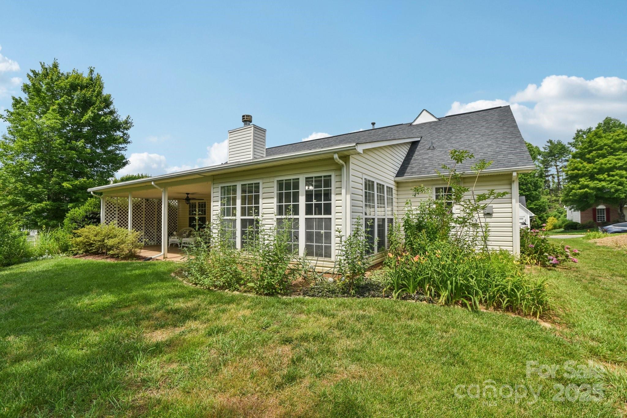 343 Stonehollow Road Fletcher, NC 28732 - Photo 29 of 36 a front view of house with yard and green space