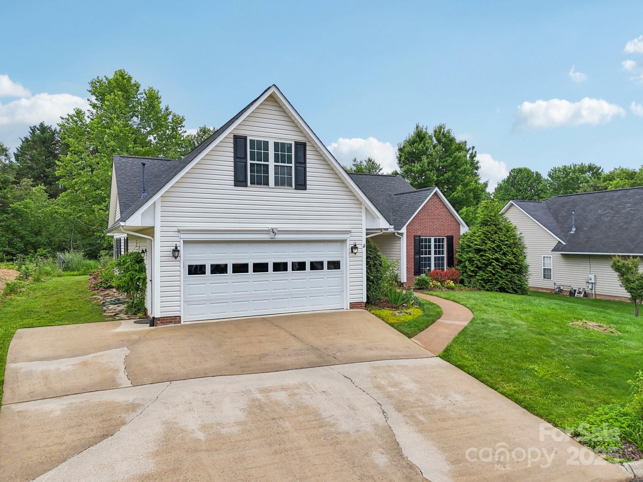 343 Stonehollow Road Fletcher, NC 28732 - Photo 32 of 36 a view of a house with a yard and fence