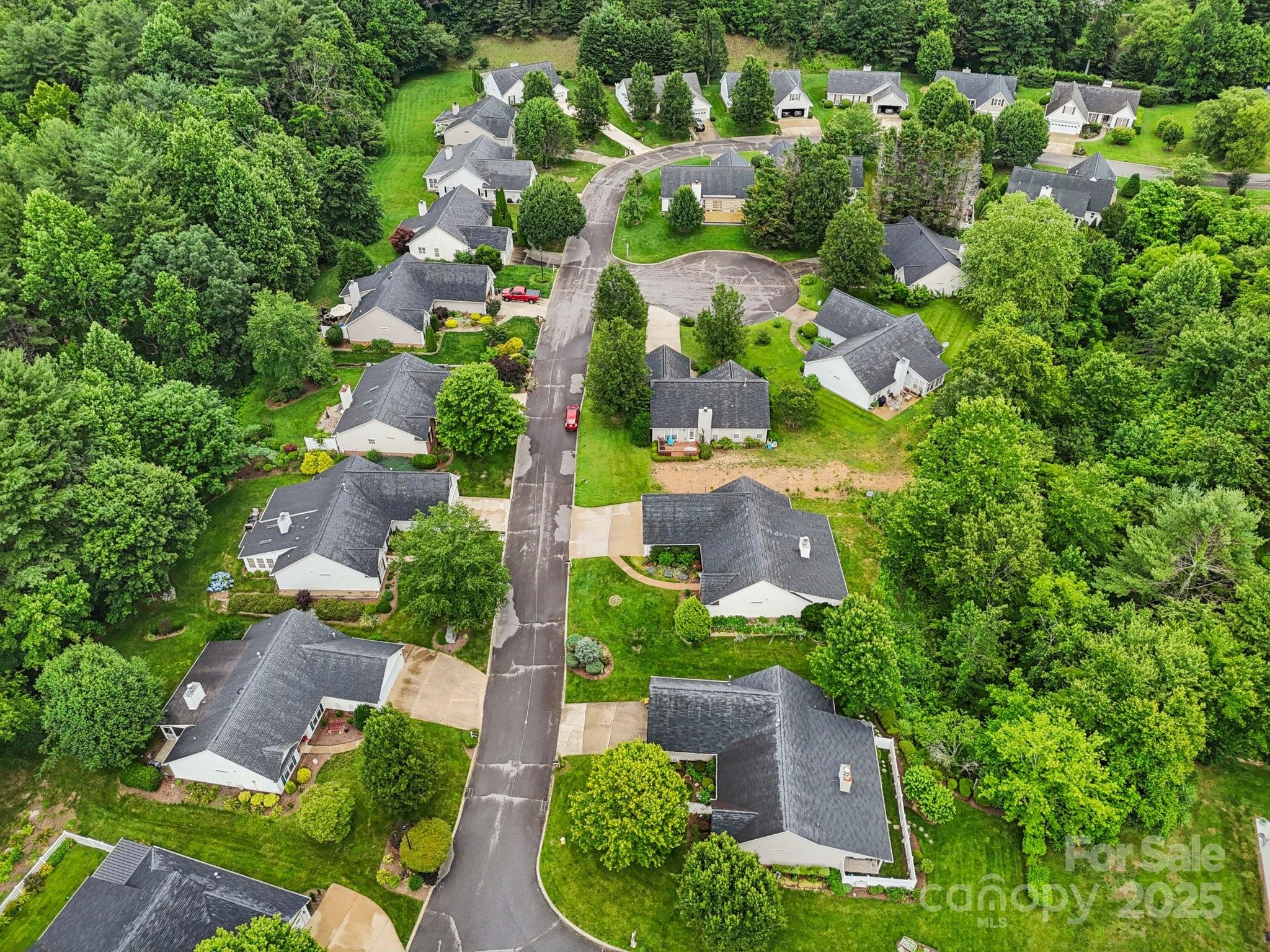 343 Stonehollow Road Fletcher, NC 28732 - Photo 35 of 36 an aerial view of residential houses with outdoor space and trees all around