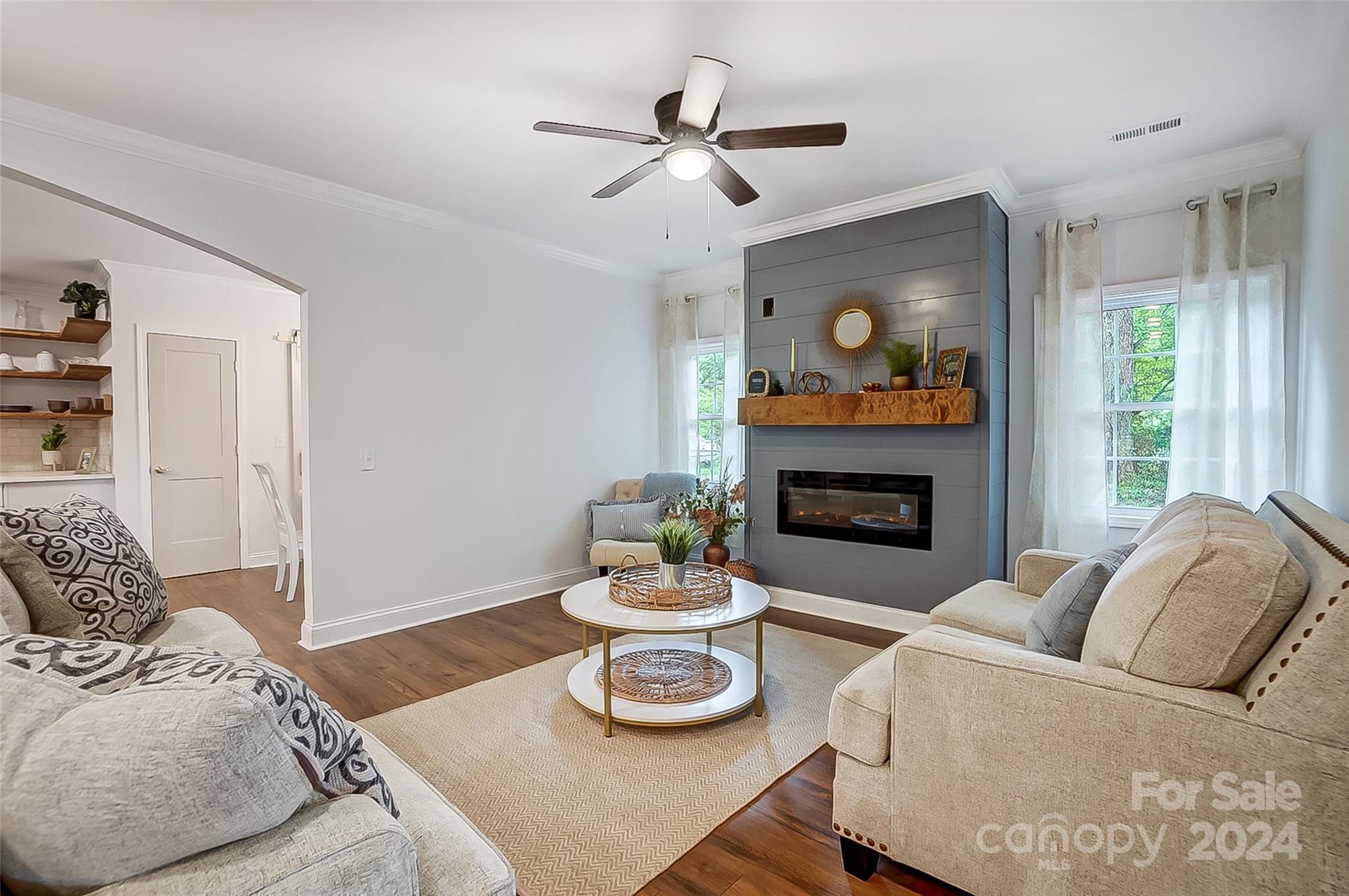 1129 Duckwood Road Lancaster, SC 29720 - Photo 11 of 48 a living room with furniture and a fireplace
