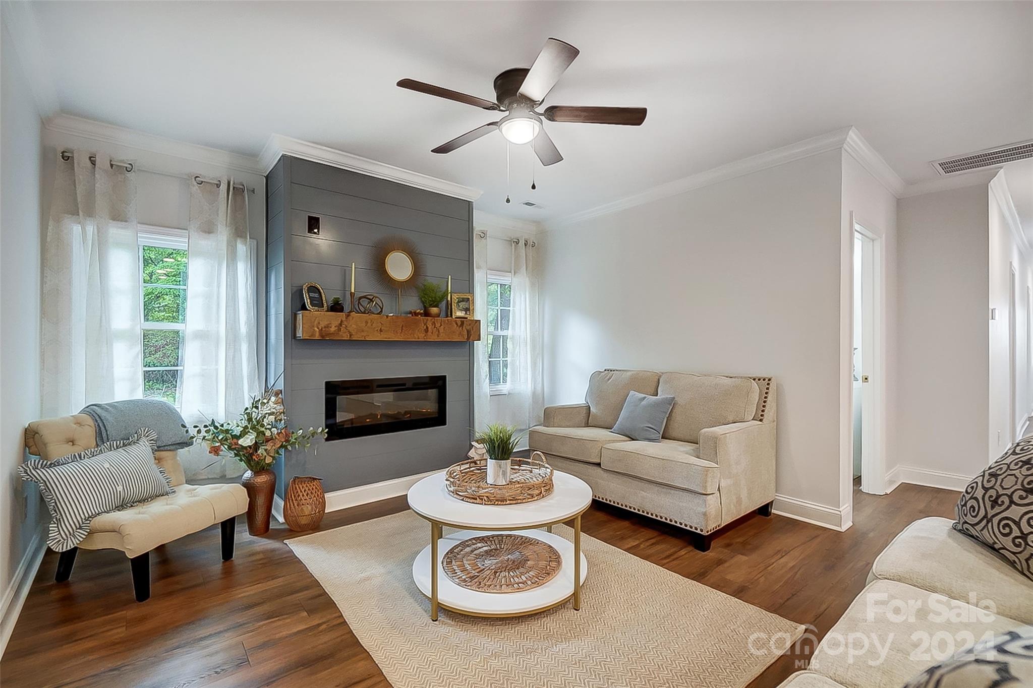 1129 Duckwood Road Lancaster, SC 29720 - Photo 12 of 48 a living room with furniture and a fireplace