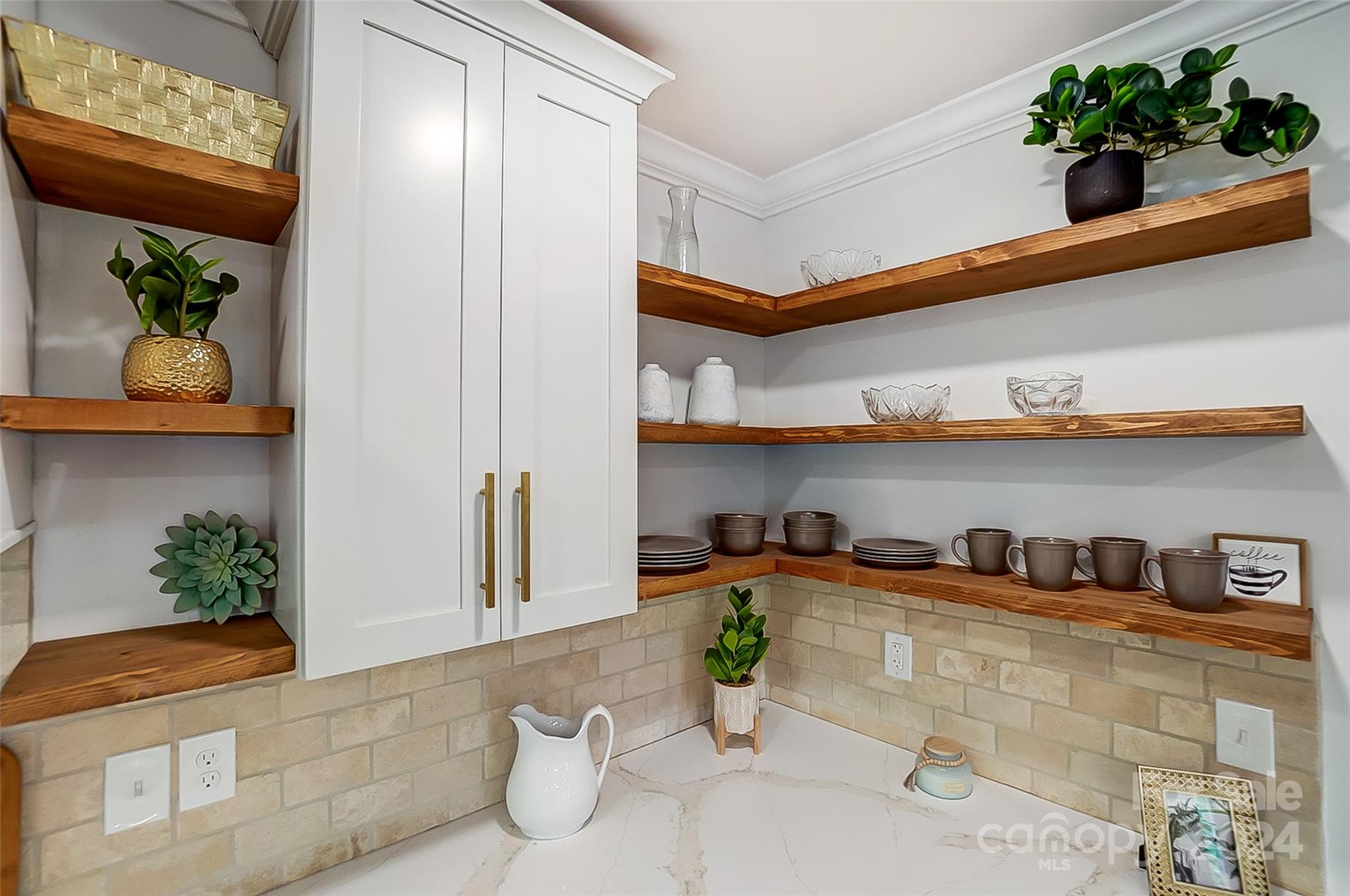 1129 Duckwood Road Lancaster, SC 29720 - Photo 22 of 48 a room with lots of potted plants