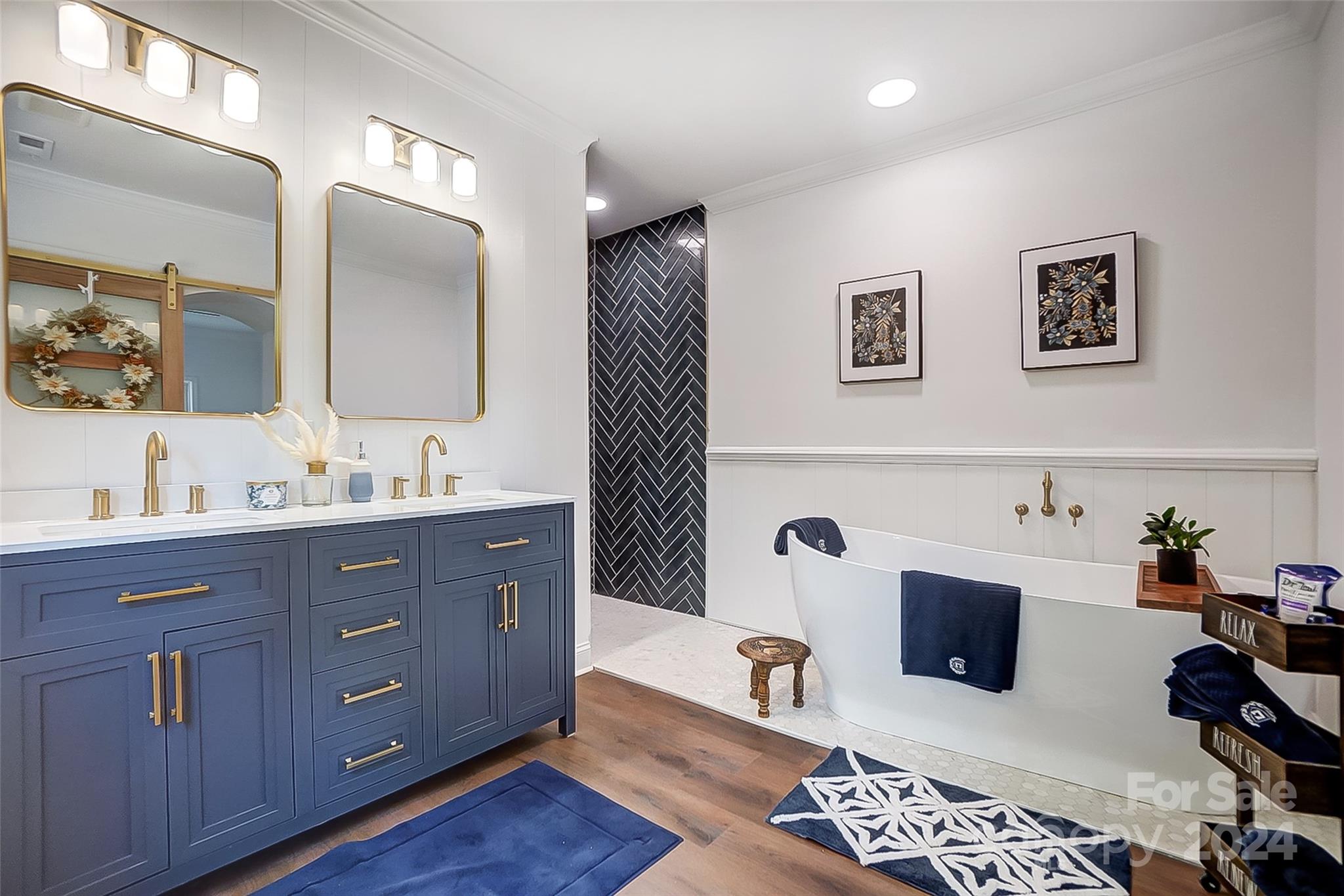 1129 Duckwood Road Lancaster, SC 29720 - Photo 31 of 48 a spacious bathroom with double vanity and a mirror
