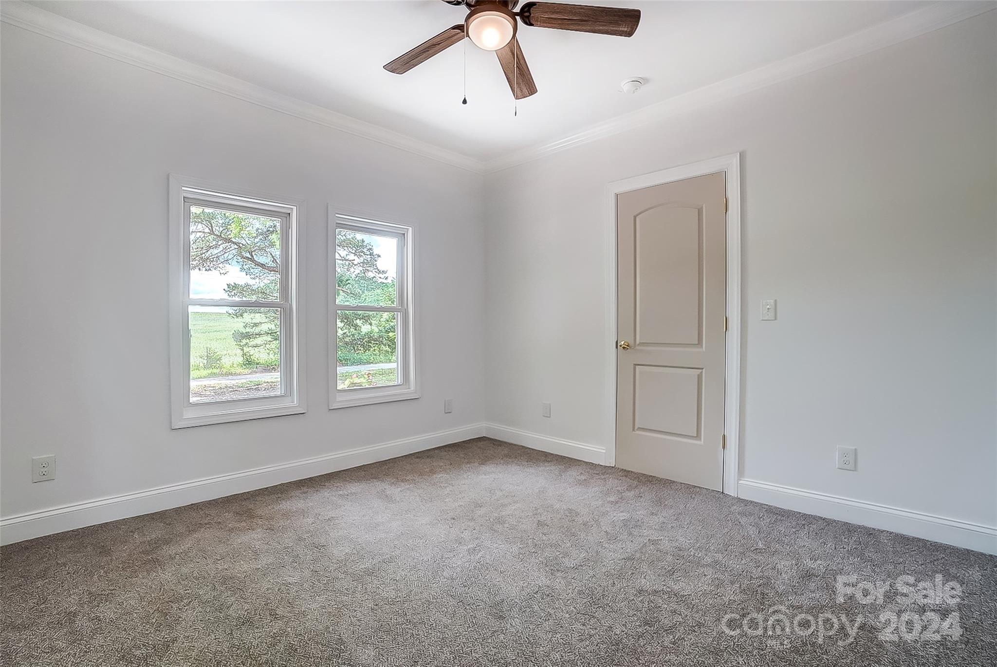 1129 Duckwood Road Lancaster, SC 29720 - Photo 42 of 48 a view of empty room with window and ceiling fan