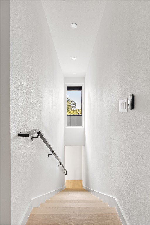 613 Clifford Drive, Unit A Austin, TX 78745 - Photo 15 of 40 a view of a hallway with staircase