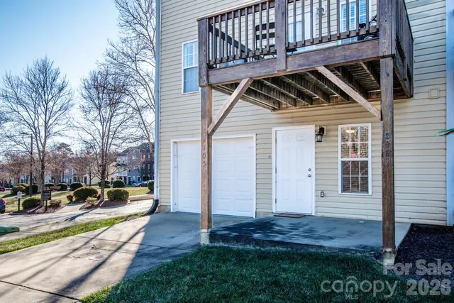 a view of a backyard with sitting area