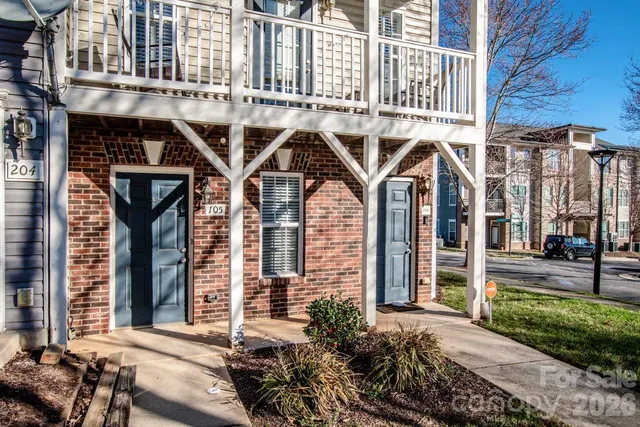 a front view of a building with glass windows