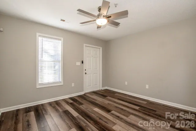 a view of a room with a window