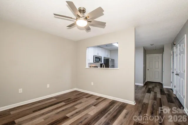 a view of a bedroom with a bed
