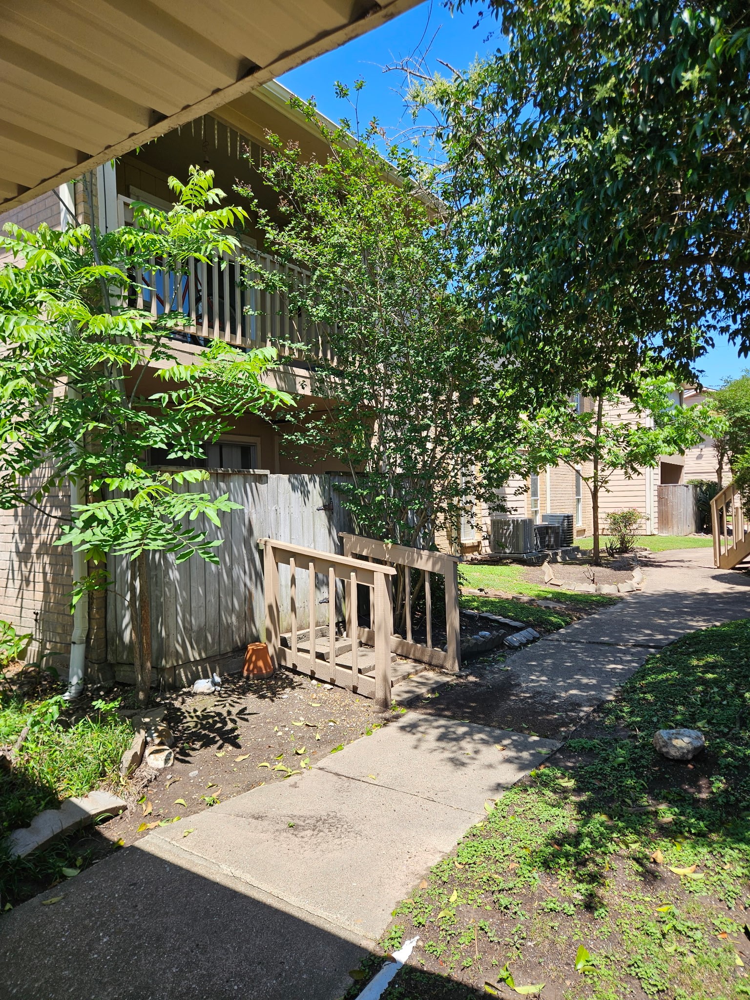 1505 Ward Road, Unit 112 Baytown, TX 77520 - Photo 15 of 15 a view of a house with backyard and sitting area