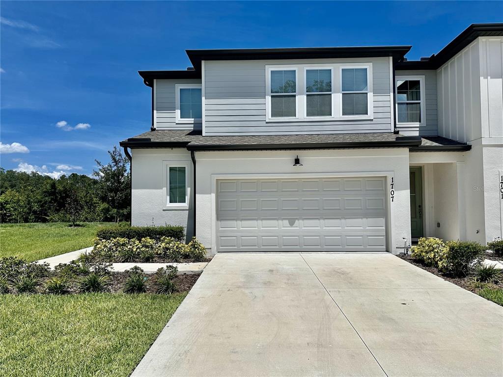 1707 Sanibel Drive Davenport, FL 33896 - Photo 1 of 1 a front view of a house with a yard