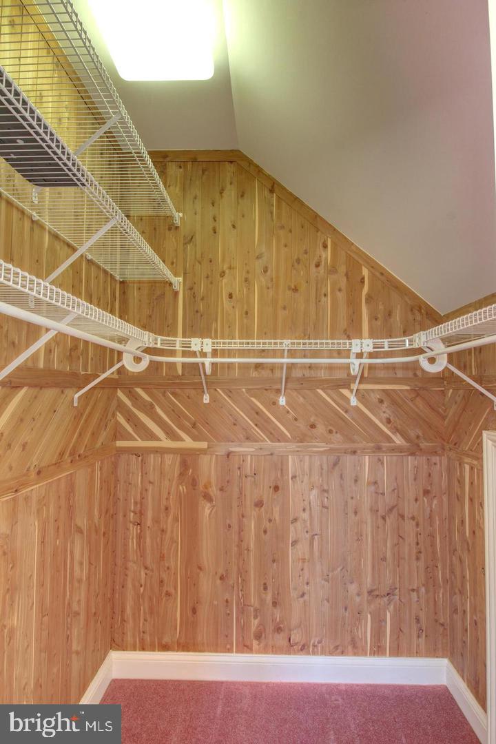 17235 Whisper Hill Road Culpeper, VA 22701 - Photo 12 of 24 a view of a room with a wooden floor and shower