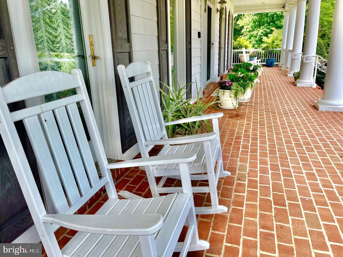 17235 Whisper Hill Road Culpeper, VA 22701 - Photo 2 of 24 a view of an outdoor space with seating area