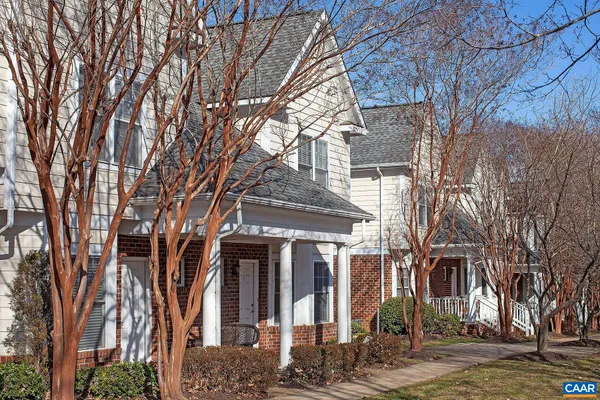 a view of a building with a tree