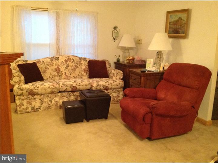 1762 Crown Point Road, Unit E9 Thorofare, NJ 08086 - Photo 13 of 23 a living room with furniture