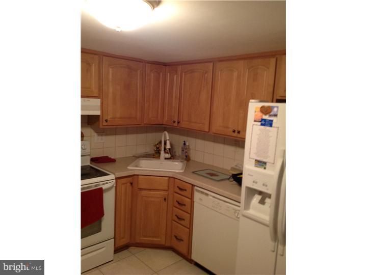 1762 Crown Point Road, Unit E9 Thorofare, NJ 08086 - Photo 15 of 23 a utility room with sink dryer and washer