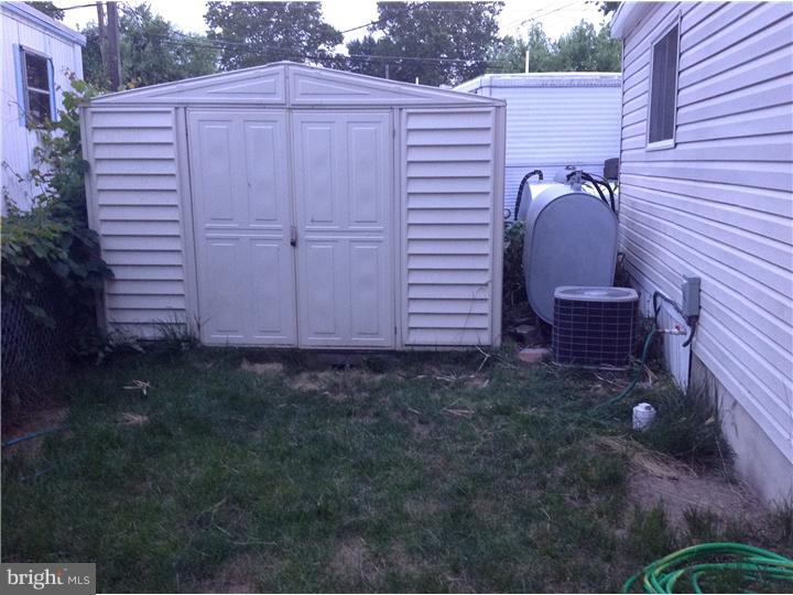 1762 Crown Point Road, Unit E9 Thorofare, NJ 08086 - Photo 6 of 23 a view of a backyard