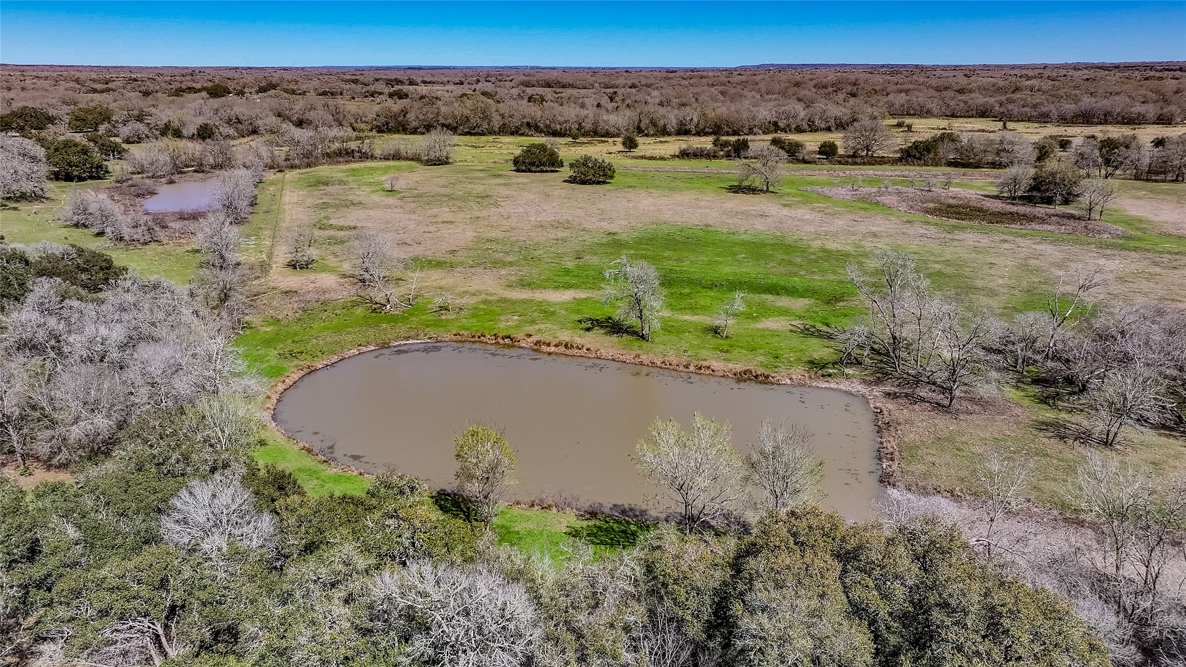 3817 Fm 154 Muldoon, TX 78949 - Photo 25 of 38 an aerial view of a house with a yard and lake view
