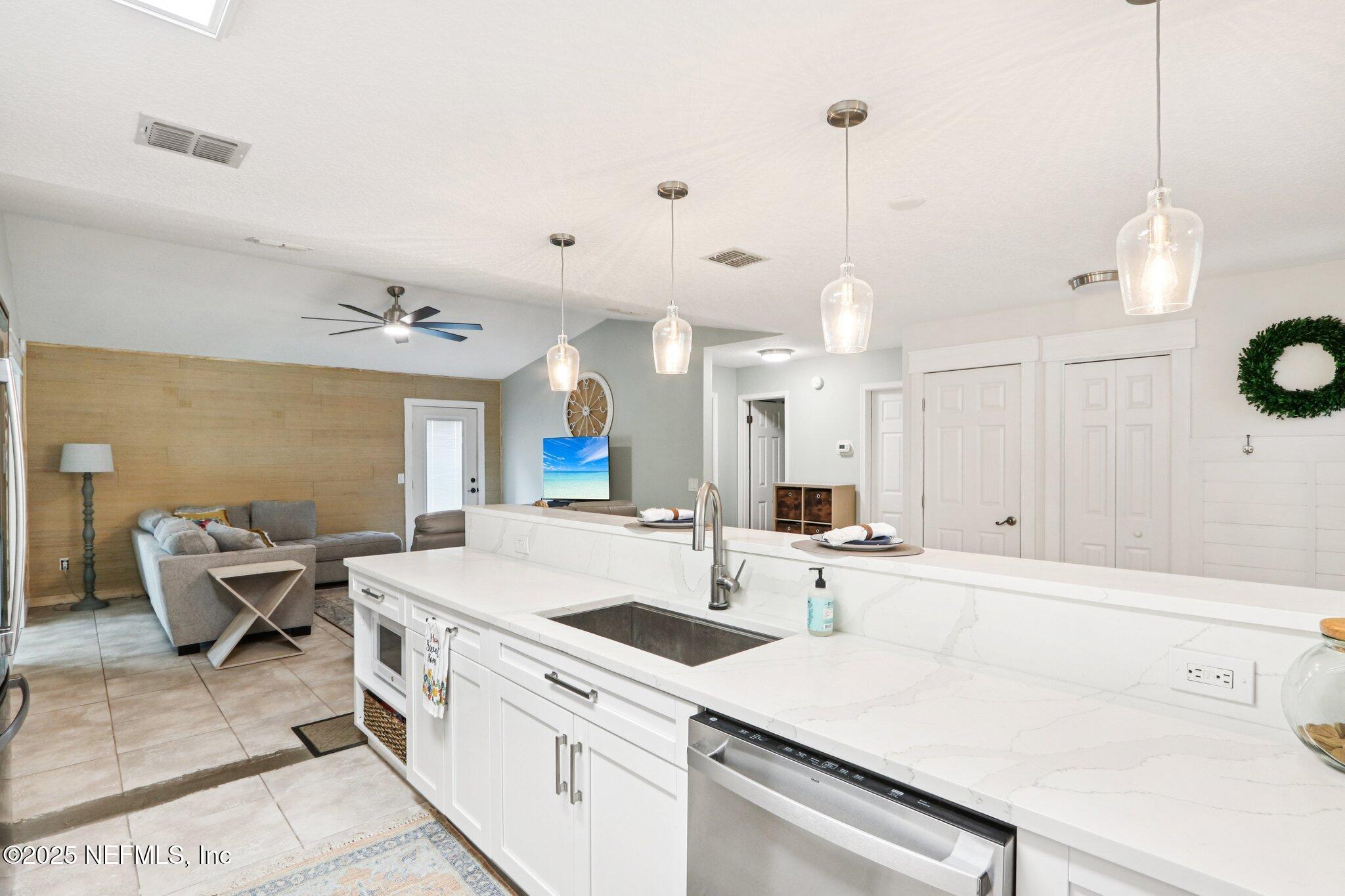 1649 Panther Ridge Court Jacksonville, FL 32225 - Photo 8 of 29 a large kitchen with a table and chairs